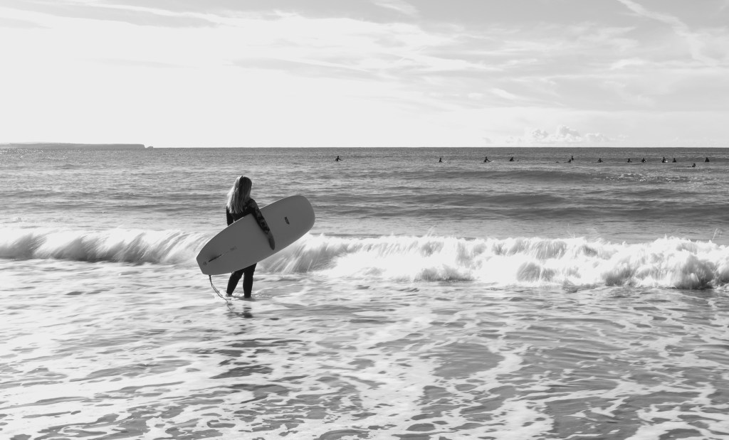 Surfer contemplating paddle out