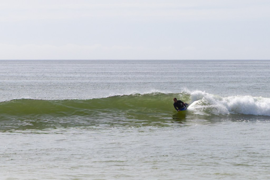 Body boarder on a nice wave