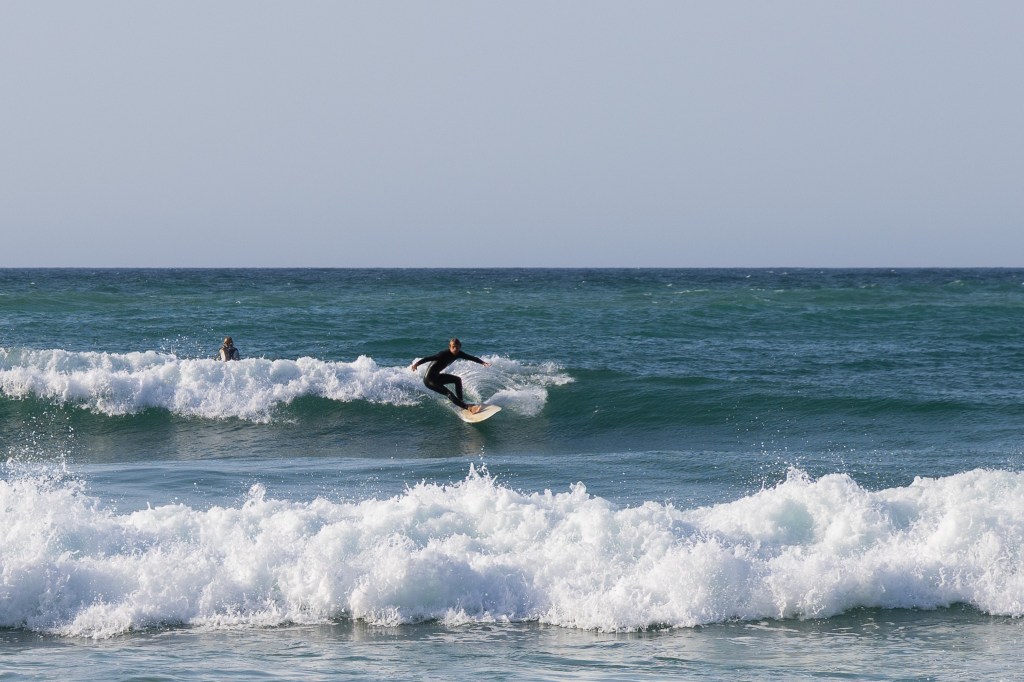 Surfer cutting back on a wave