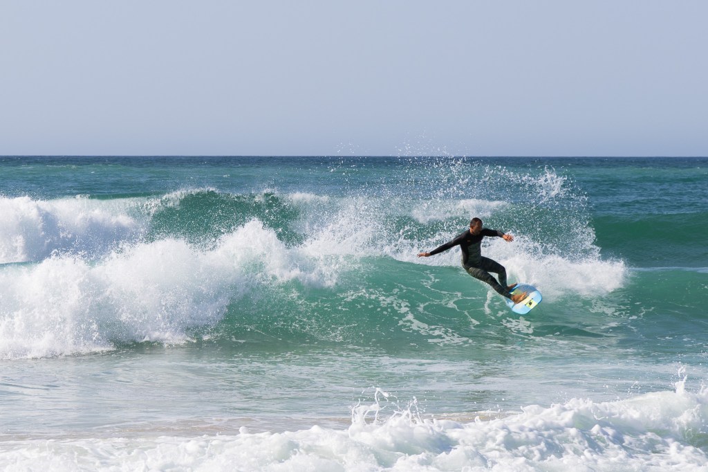 Surfer cutting back on a wave