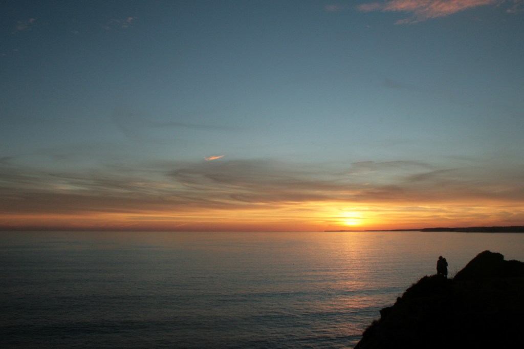 Seascape sunset with silhouette